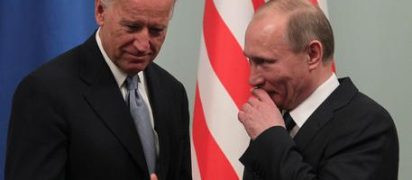 U.S. Vice President Joe Biden (L) speaks with Russian Prime Minister Vladimir Putin (R) during their meeting in Moscow, Russia 10 March 2011.ANSA/MAXIM SHIPENKOV