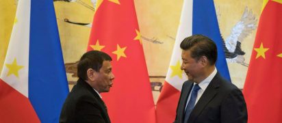 Philippines President Rodrigo Duterte and Chinese President Xi Jinping shake hands after a signing ceremony held in Beijing